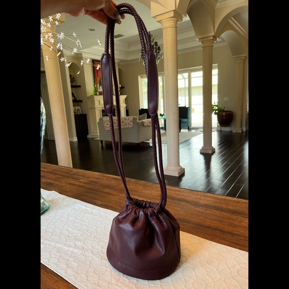 Urban Outfitters burgundy bucket bag